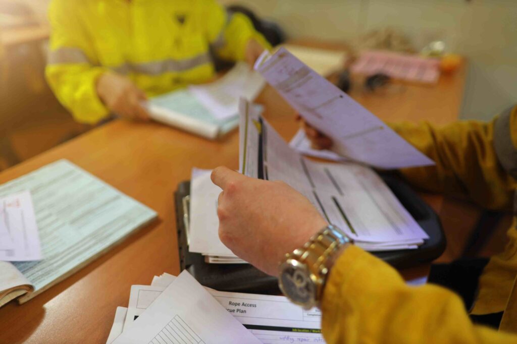close up of a person handling documents
