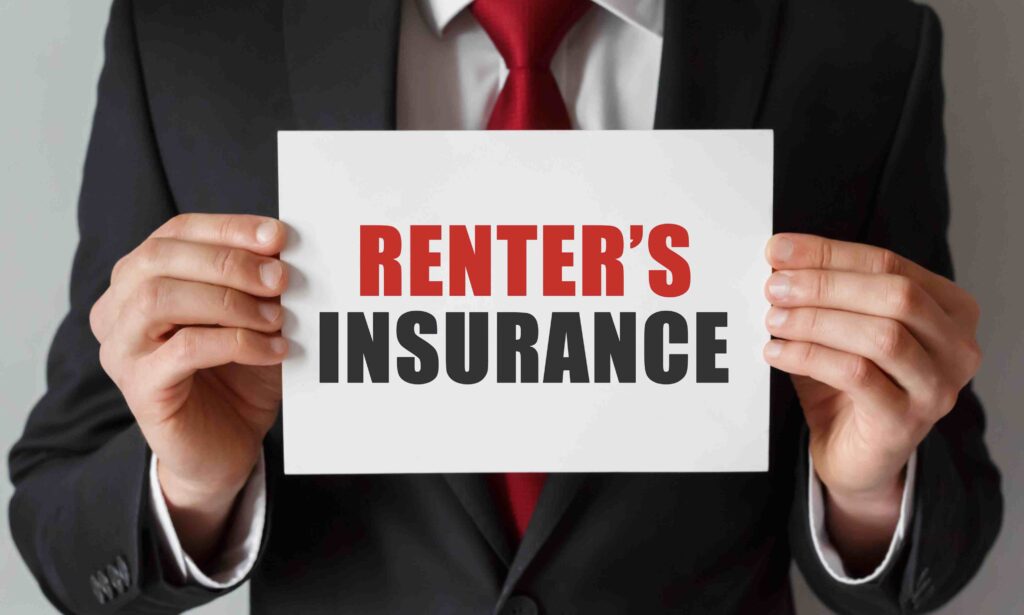 a man in a suit holding up a sign that says renter's insurance