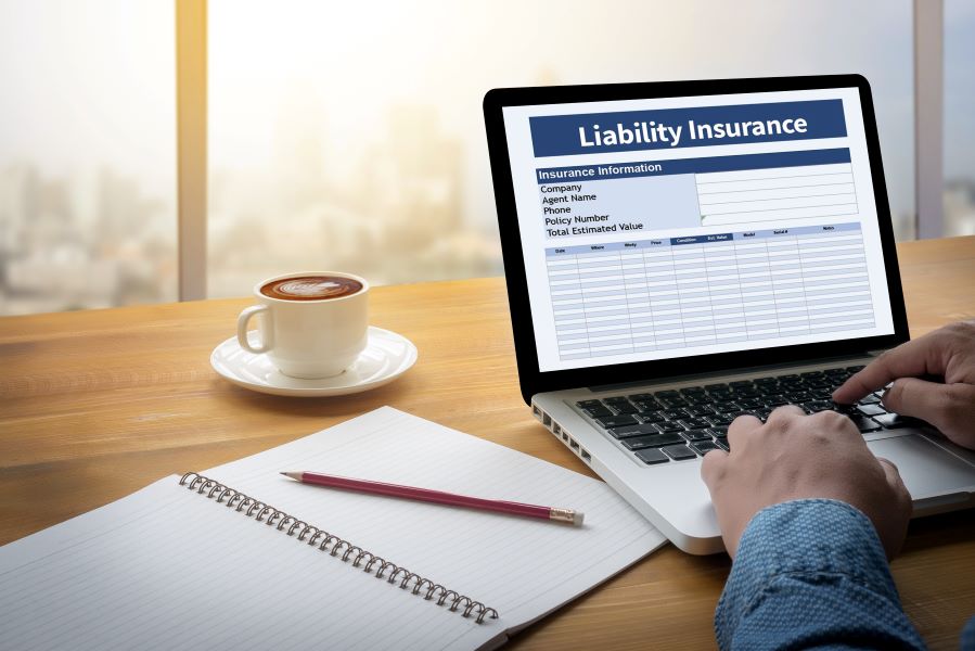 Researching liability insurance on a computer