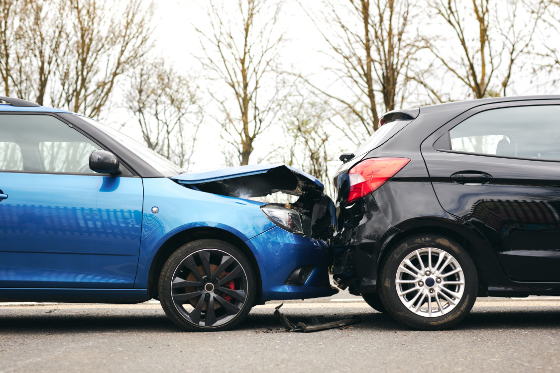 two cars bumper to bumper with accident damage