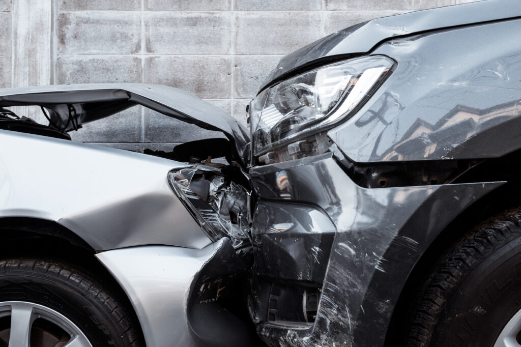 Close up of a head on car collision
